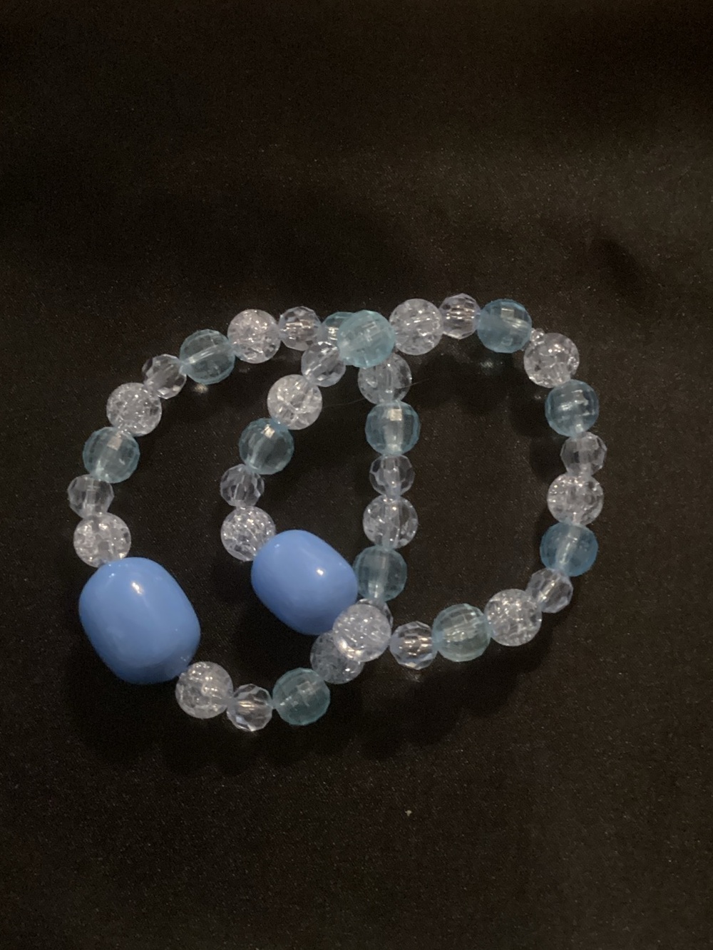 Blue and clear beads home made by me I’m 84 and make these at home